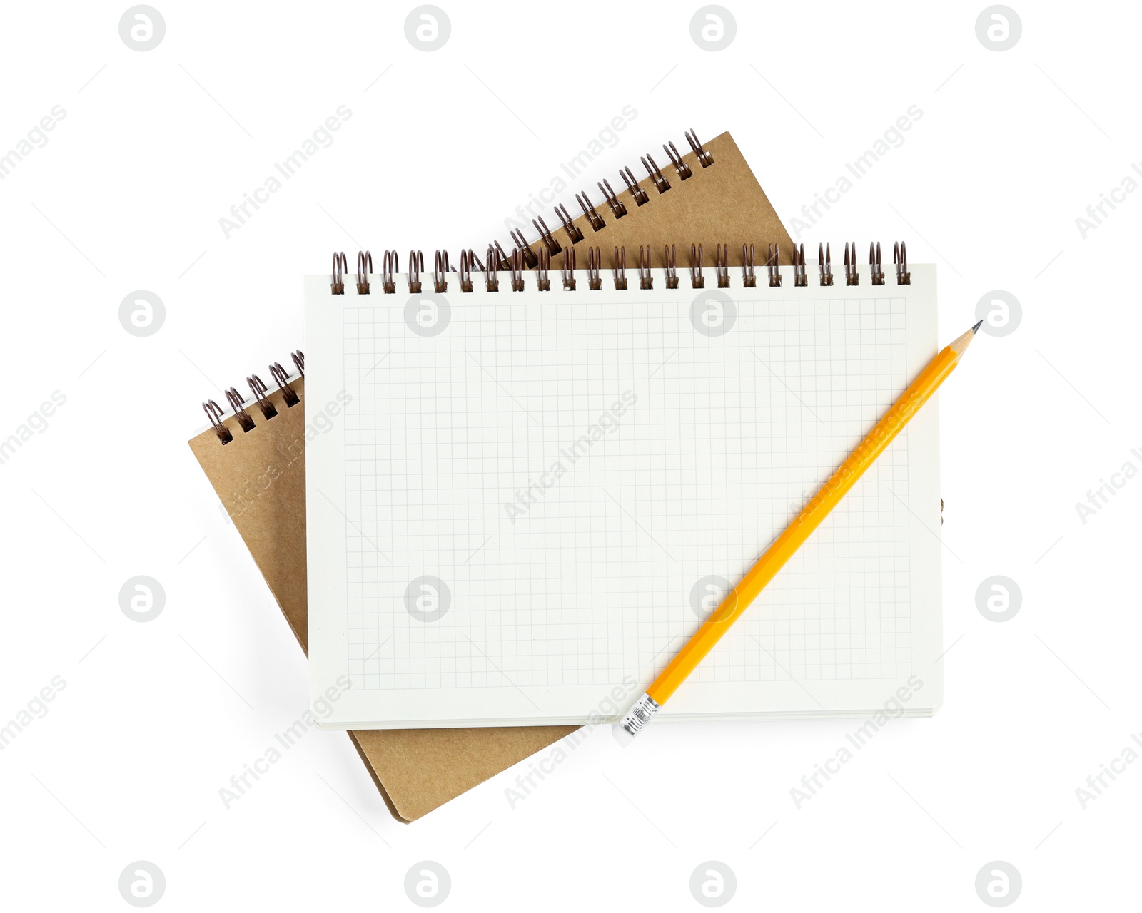 Photo of Two notebooks and pencil isolated on white, top view