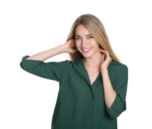 Portrait of beautiful young woman with blonde hair on white background