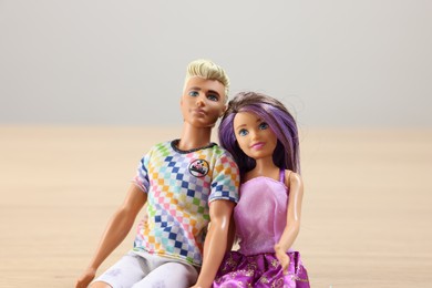 Leiden, Netherlands - September 20, 2023: Stylish Barbie and Ken dolls on blurred background