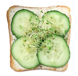 Photo of Tasty toast with cucumber, butter and microgreens isolated on white, top view