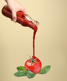 Image of Woman pouring organic ketchup onto tomato against beige background, closeup