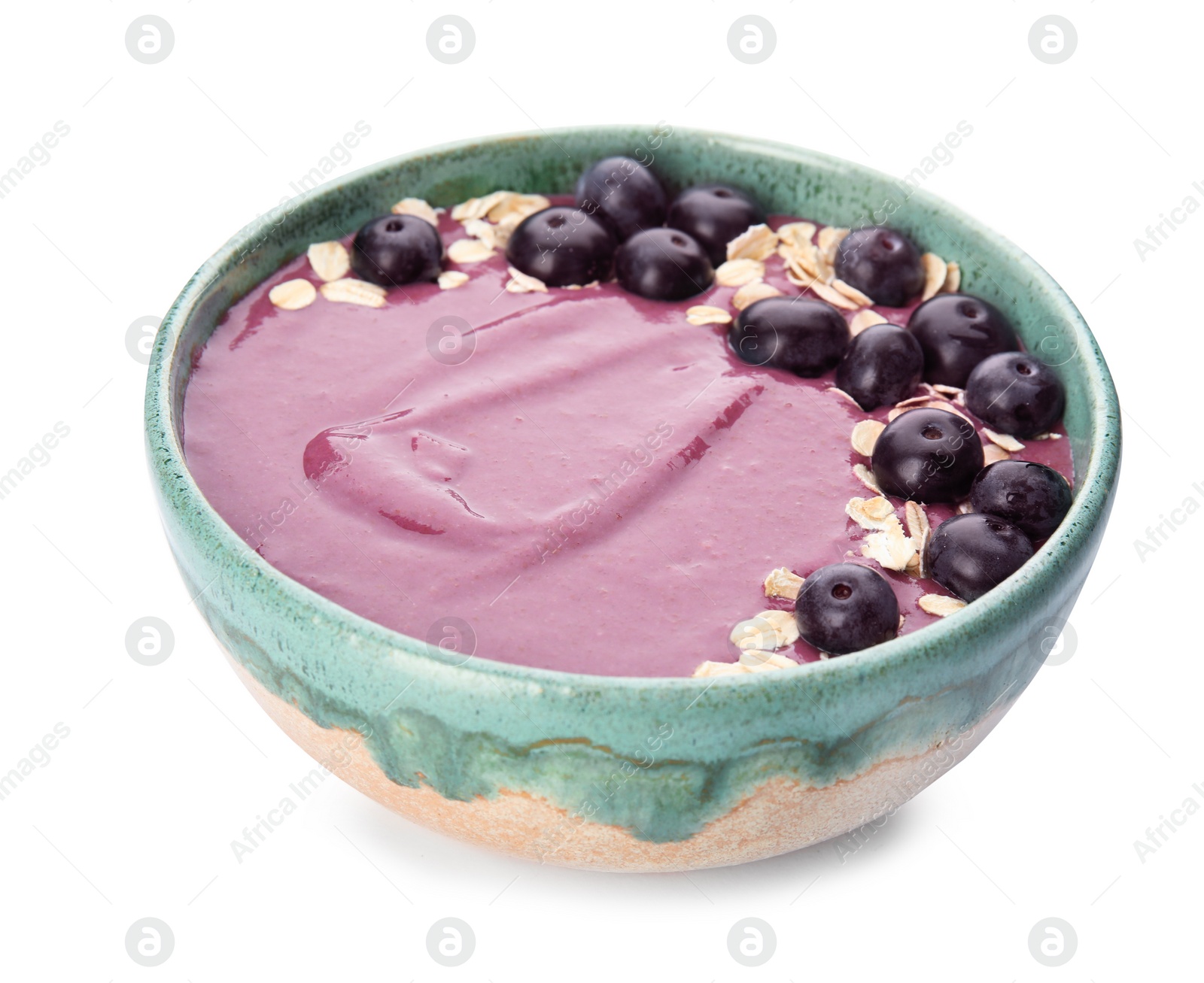 Photo of Bowl with tasty acai smoothie on white background