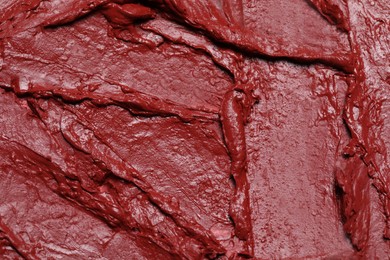 Photo of Texture of beautiful lipstick as background, closeup