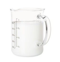 Photo of Fresh milk in measuring cup isolated on white