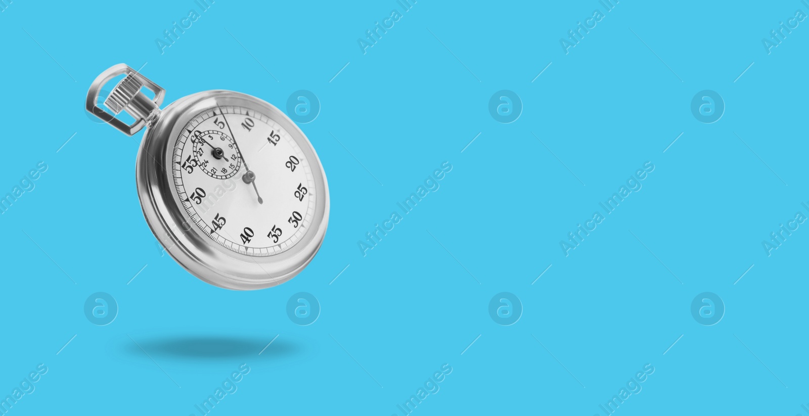 Image of Concept of time. Vintage timer in air on light blue background, banner design. Space for text