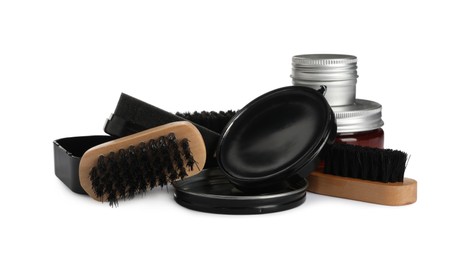 Set of shoe care products on white background
