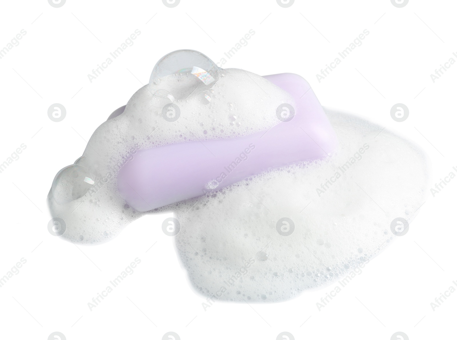 Photo of Soap bar and foam on white background