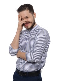 Photo of Embarrassed man covering face with hand on white background