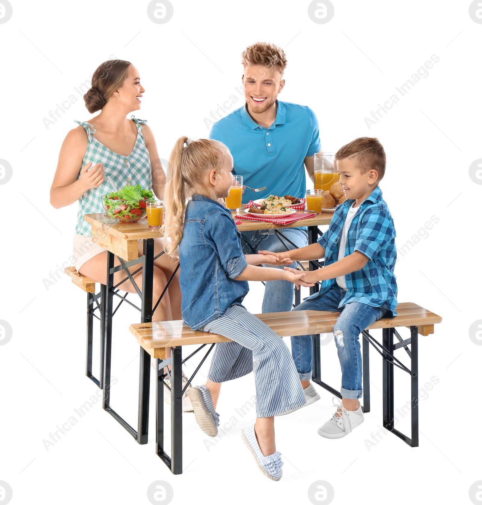 Photo of Happy family having picnic at table on white background