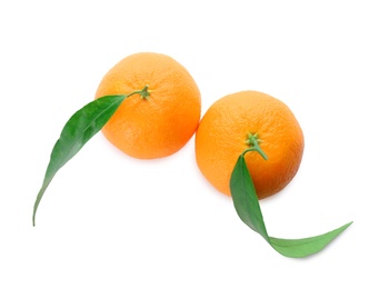 Photo of Whole fresh tangerines with green leaves on white background, top view