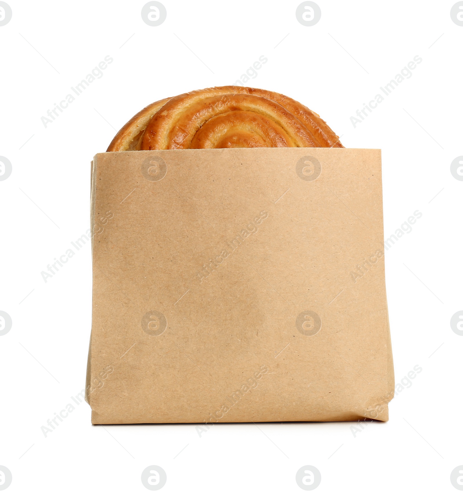 Photo of Paper bag with bun on white background. Space for design