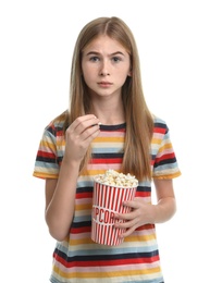 Photo of Emotional teenage girl with popcorn during cinema show on white background
