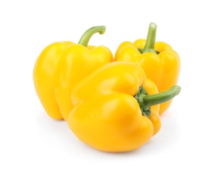 Photo of Ripe yellow bell peppers isolated on white