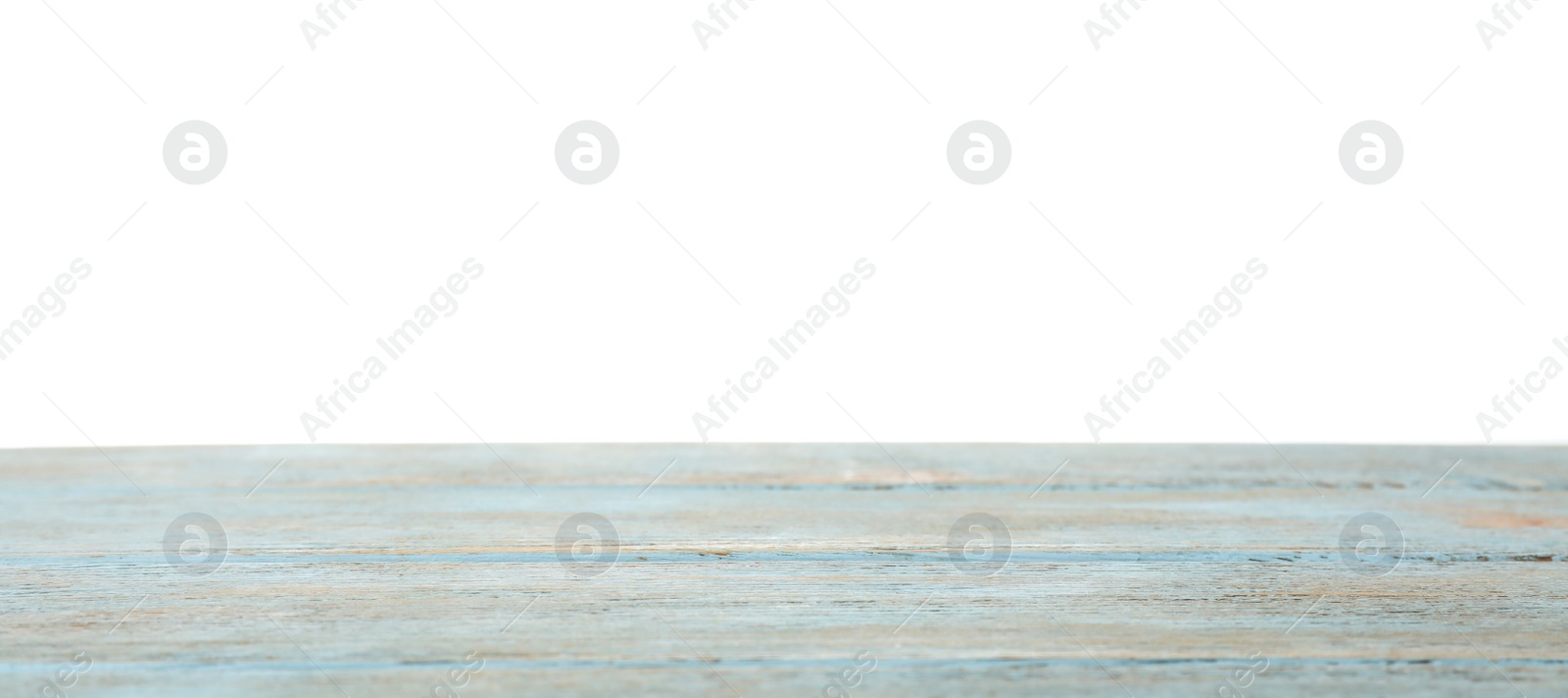 Photo of Empty wooden table surface on white background. Mockup for design