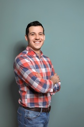 Photo of Portrait of confident man on color background