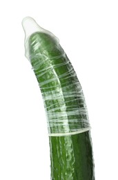 Photo of Cucumber with condom isolated on white. Safe sex concept