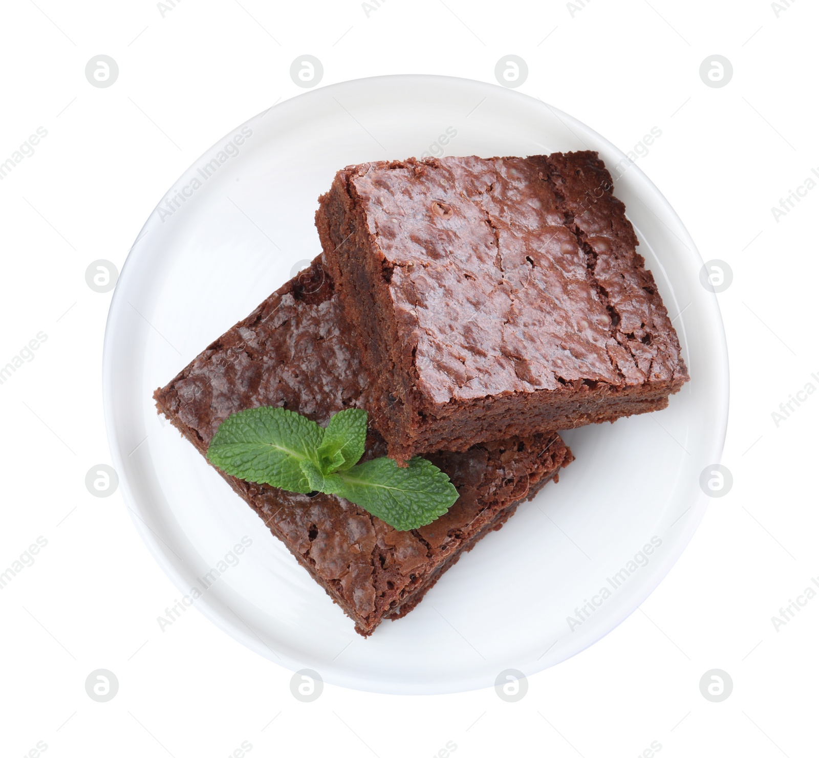 Photo of Pieces of delicious chocolate brownie with fresh mint on white background, top view