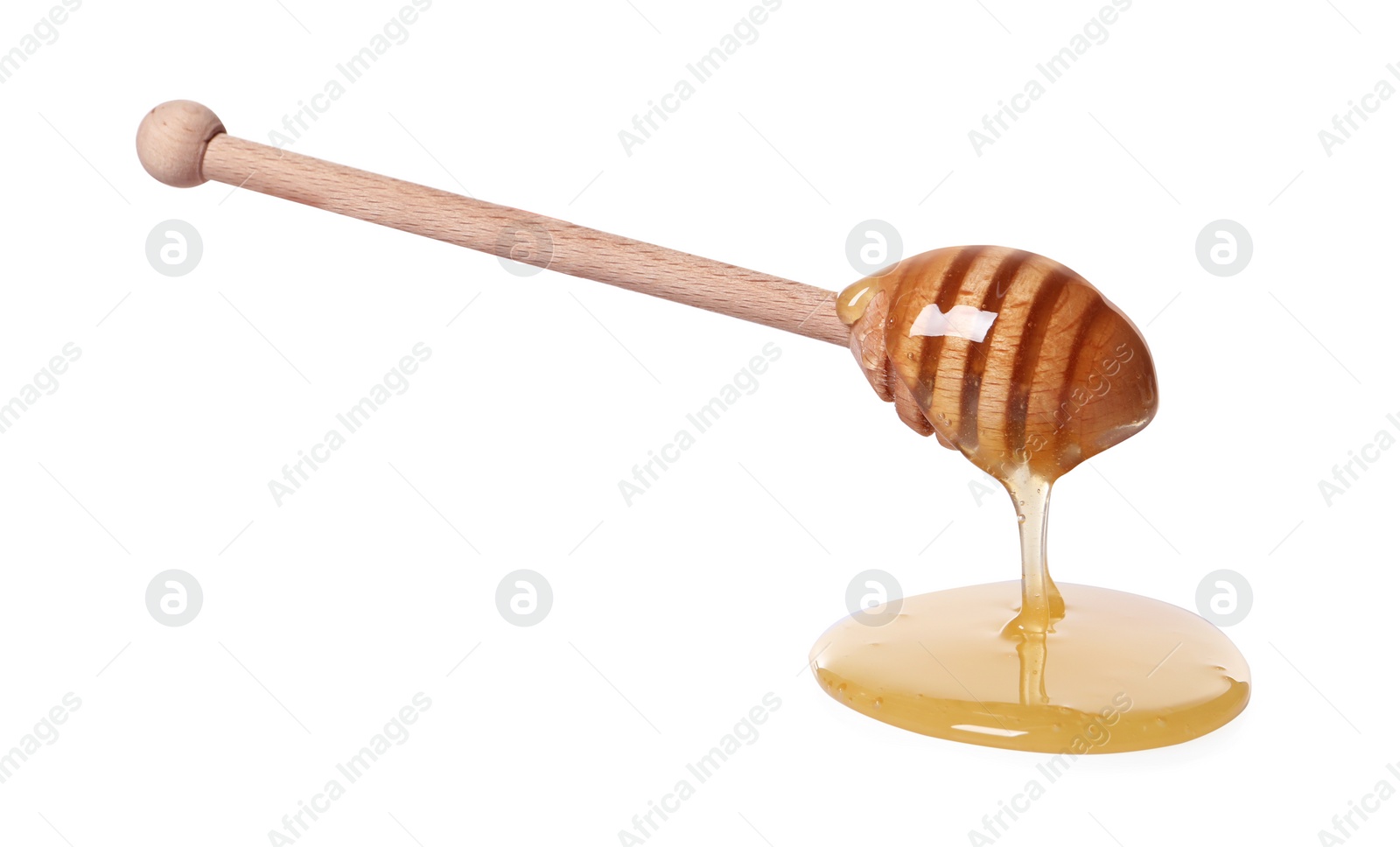 Photo of Natural honey dripping from dipper on white background