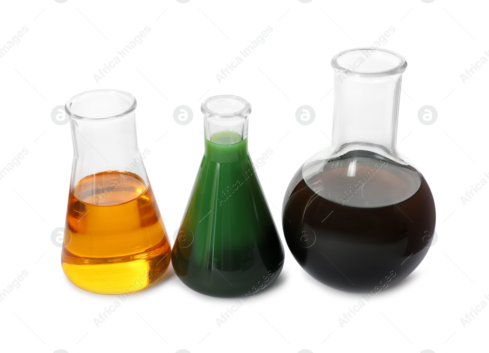 Photo of Flasks with different types of oil isolated on white