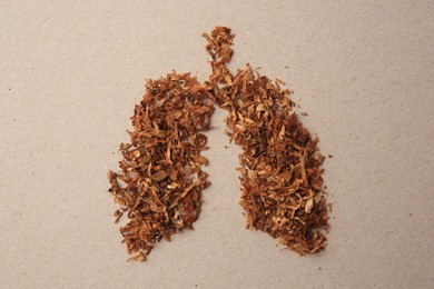 Human lungs made of tobacco on paper, top view. No smoking concept