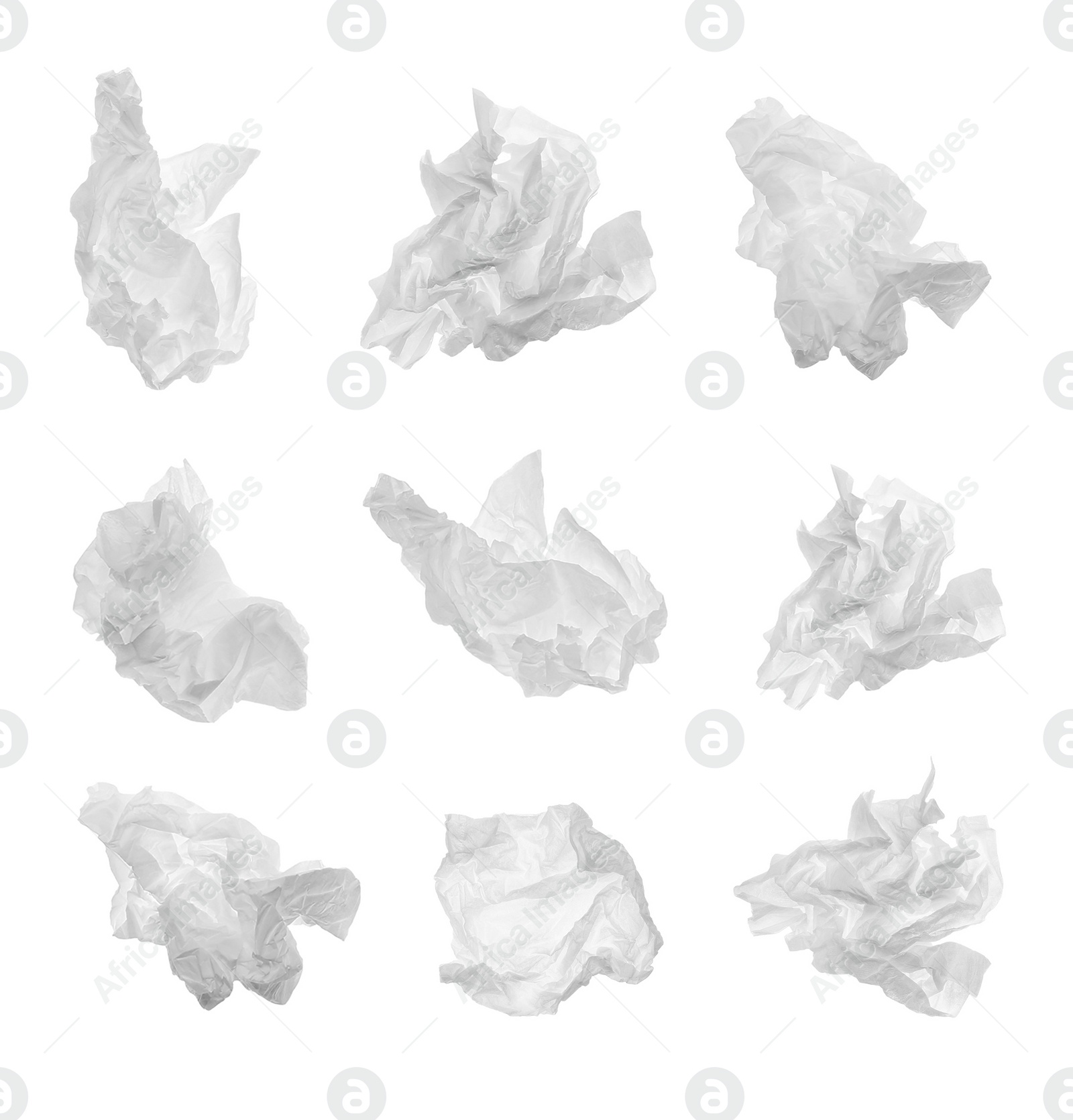 Image of Set with used crumpled paper tissues on white background