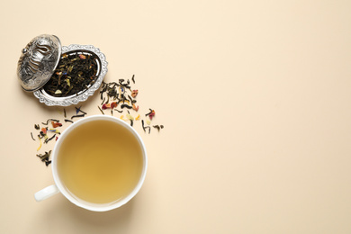 Photo of Flat lay composition with green tea on beige background. Space for text