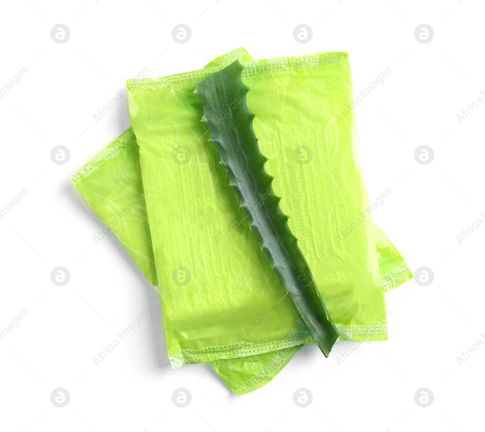 Photo of Menstrual pads and aloe leaf on white background, top view. Gynecological care