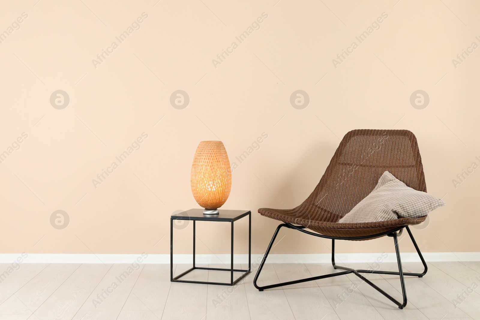 Photo of Comfortable armchair in stylish living room interior with space for text