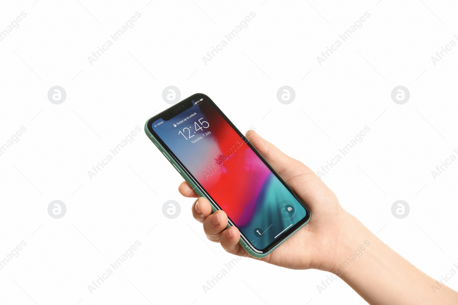 Photo of MYKOLAIV, UKRAINE - JUNE 9, 2020: Woman holding  iPhone X with locked screen on white background, closeup