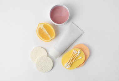 Photo of Lemon face wash. Fresh citrus fruits and personal care products on white background, flat lay