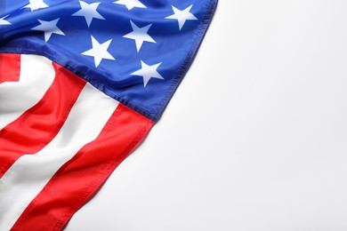 Photo of American flag on white background, top view