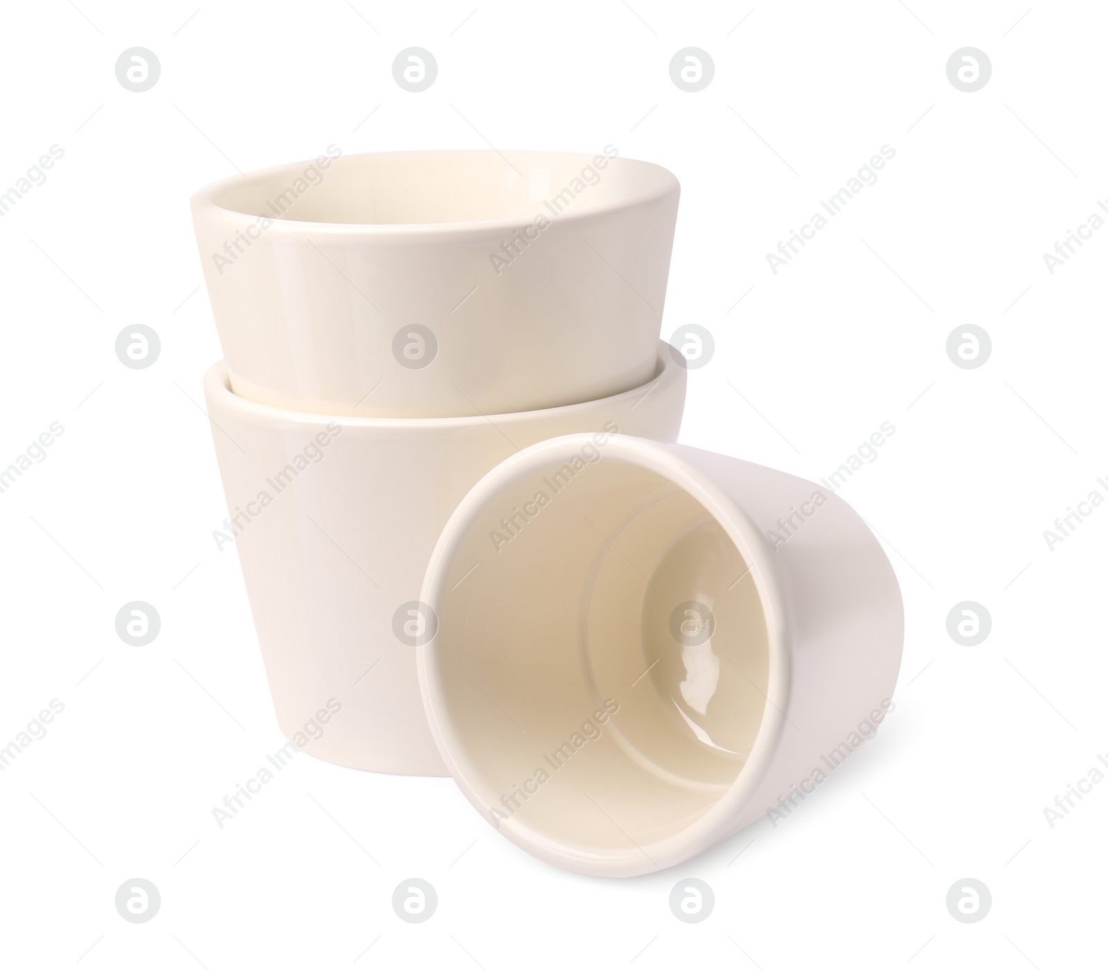 Photo of Empty ceramic flower pots on white background