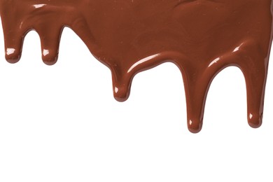 Tasty melted milk chocolate pouring down on white background