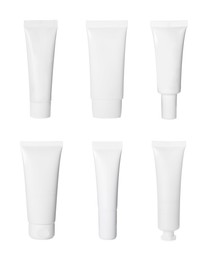 Image of Set with blank tubes of cosmetic products on white background. Mockup for design