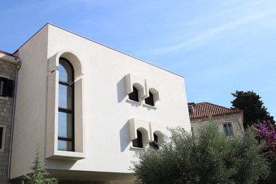 Photo of Exterior of residential building against blue sky