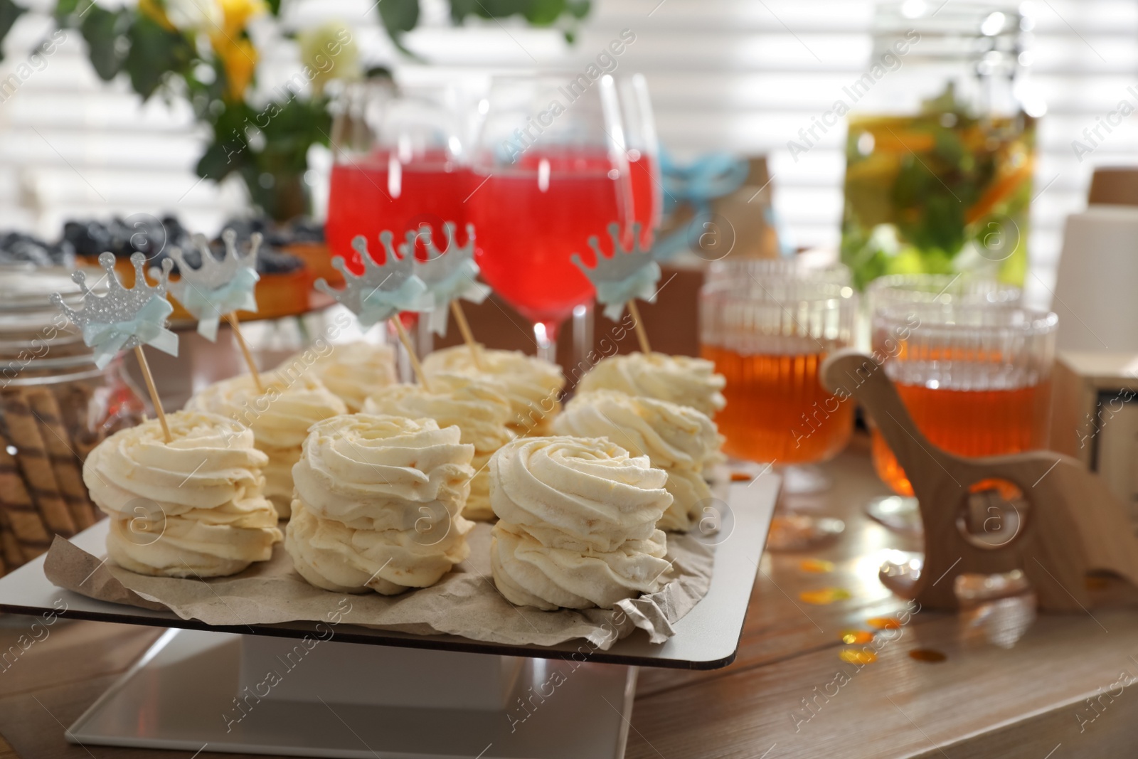 Photo of Delicious party treats on wooden table indoors