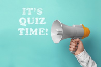 Image of Phrase IT'S QUIZ TIME and man holding megaphone on turquoise background, closeup 