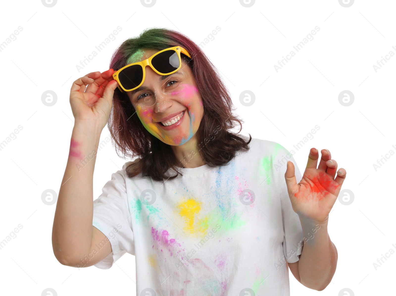 Photo of Woman covered with colorful powder dyes on white background. Holi festival celebration