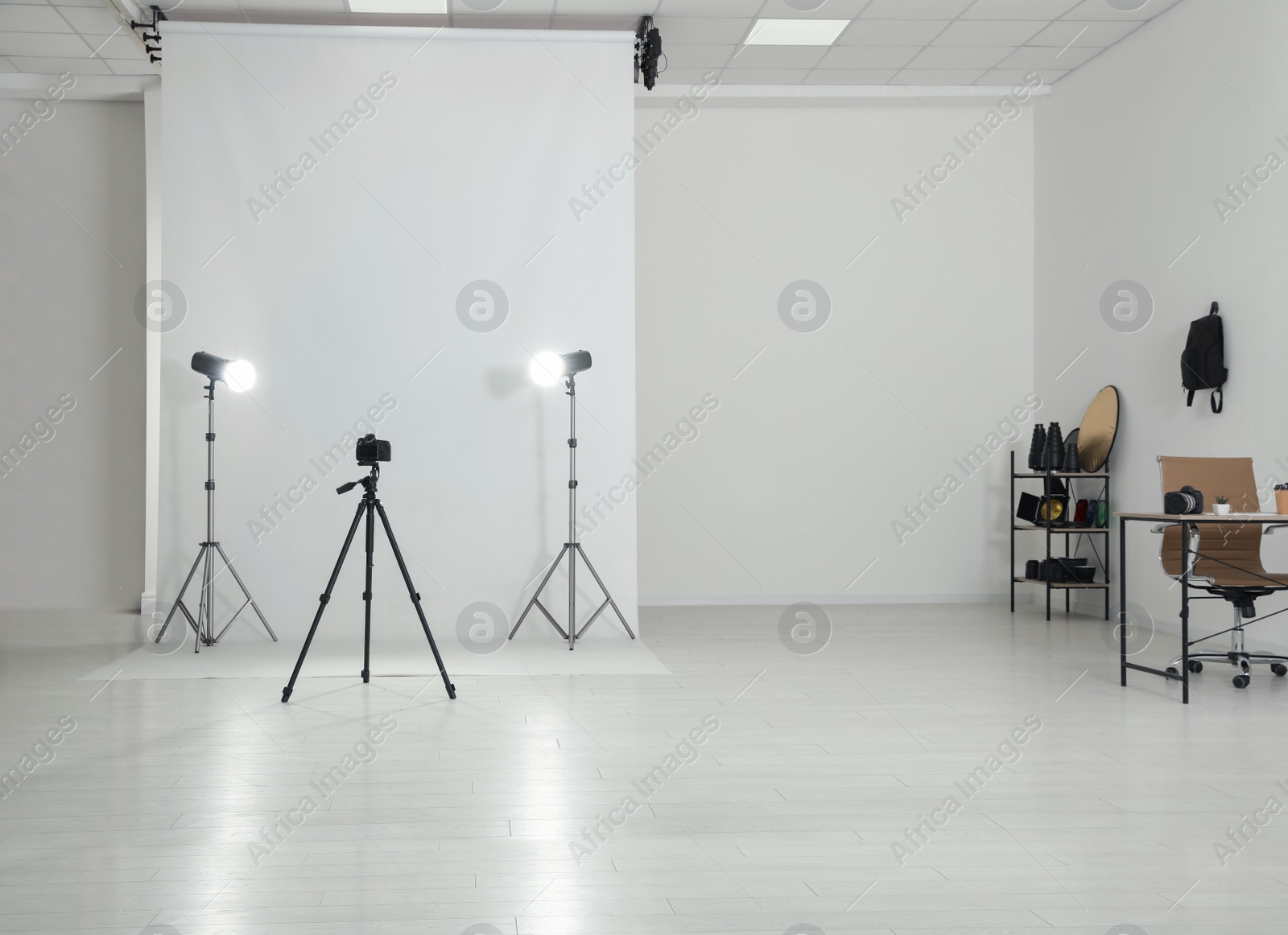 Photo of Photo studio interior with set of professional equipment