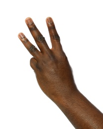 Photo of African-American man showing number THREE on white background, closeup