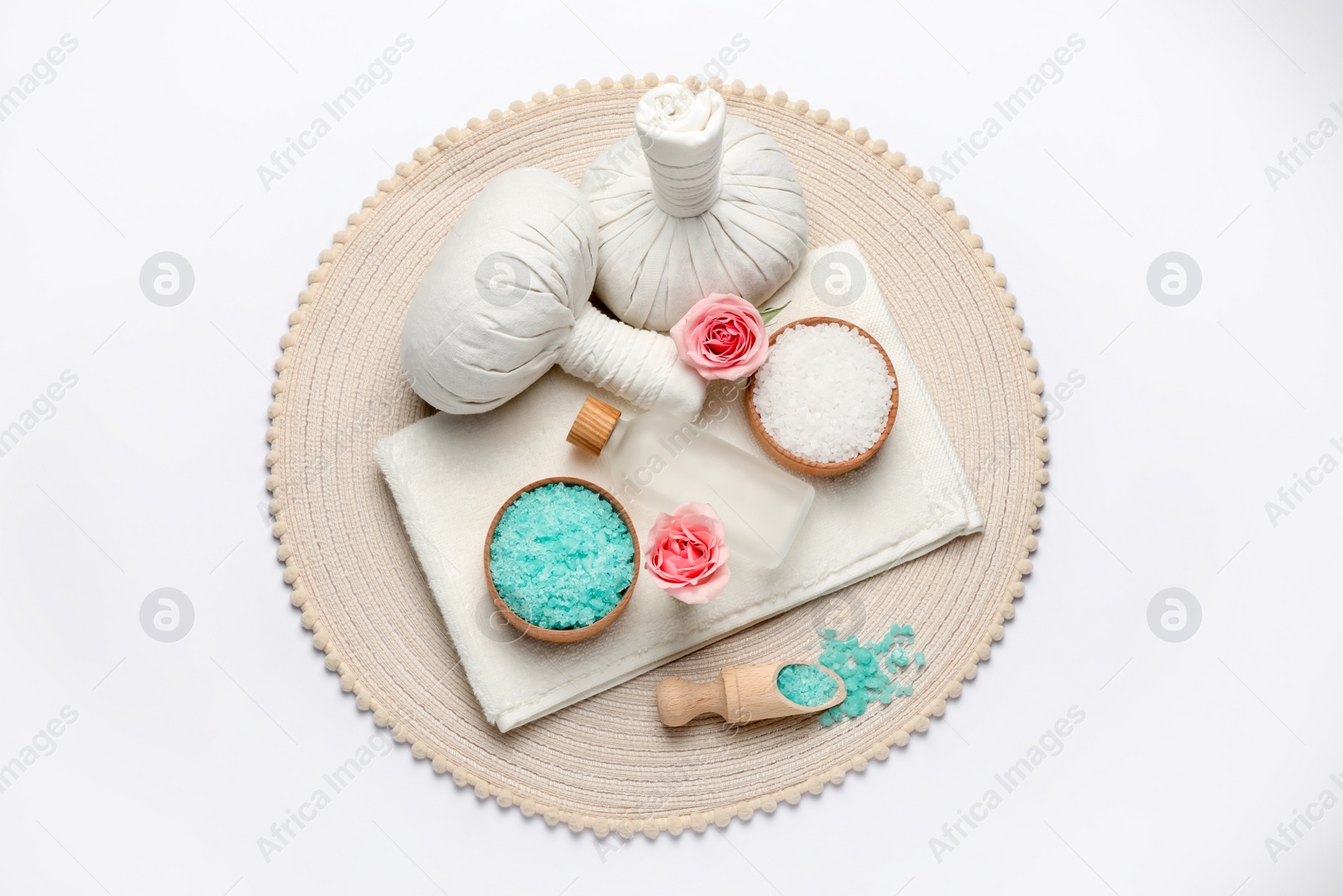 Photo of Beautiful spa composition with herbal massage bags and different care products on white background, top view