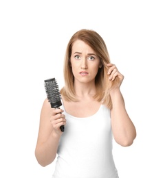 Young woman with hair loss problem on white background