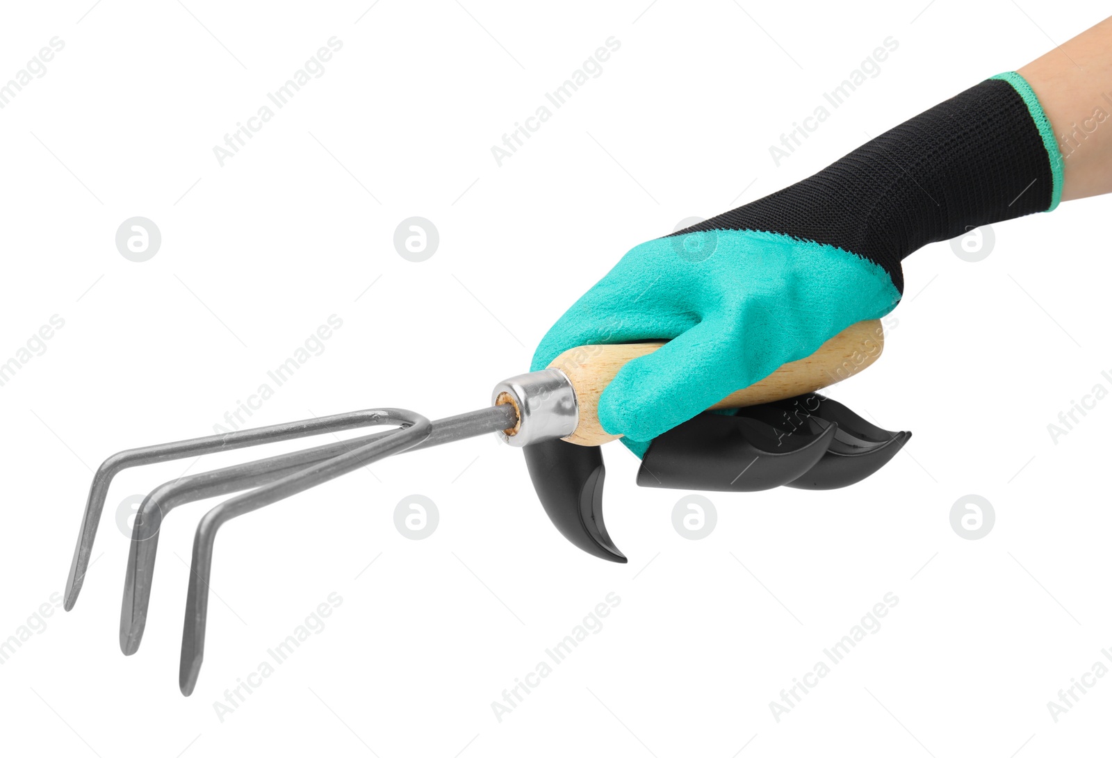 Photo of Woman in claw gardening glove holding rake on white background, closeup