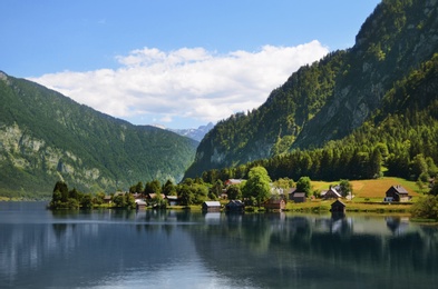 Beautiful landscape with mountains and river on sunny day