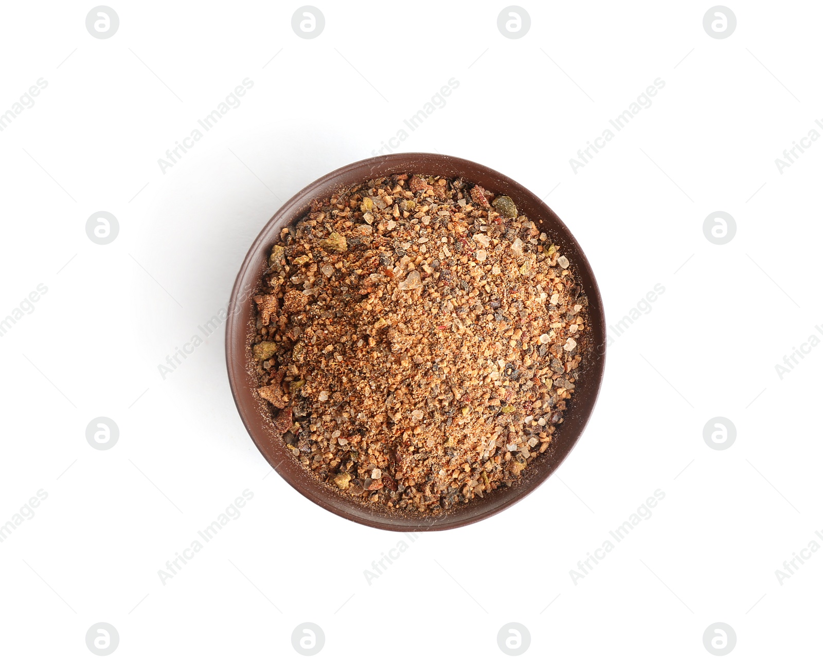 Photo of Bowl of ground pepper isolated on white, top view