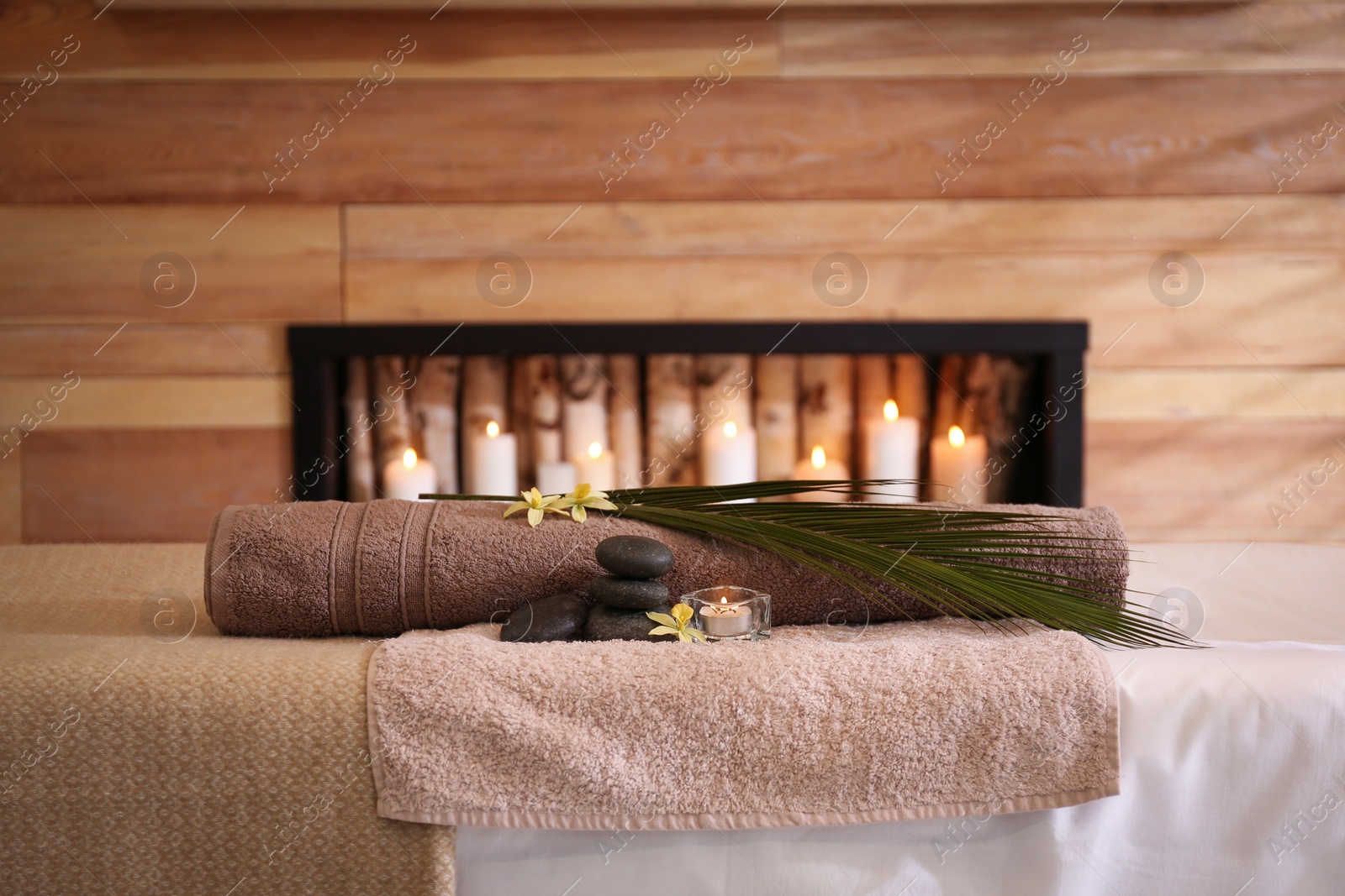 Photo of Beautiful spa accessories in stylish massage room