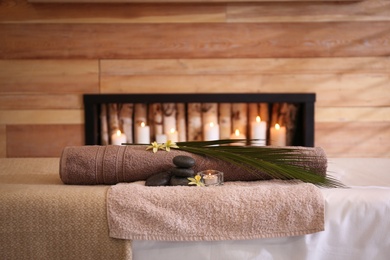 Photo of Beautiful spa accessories in stylish massage room