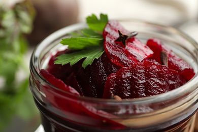 Delicious pickled beets in jar, closeup view