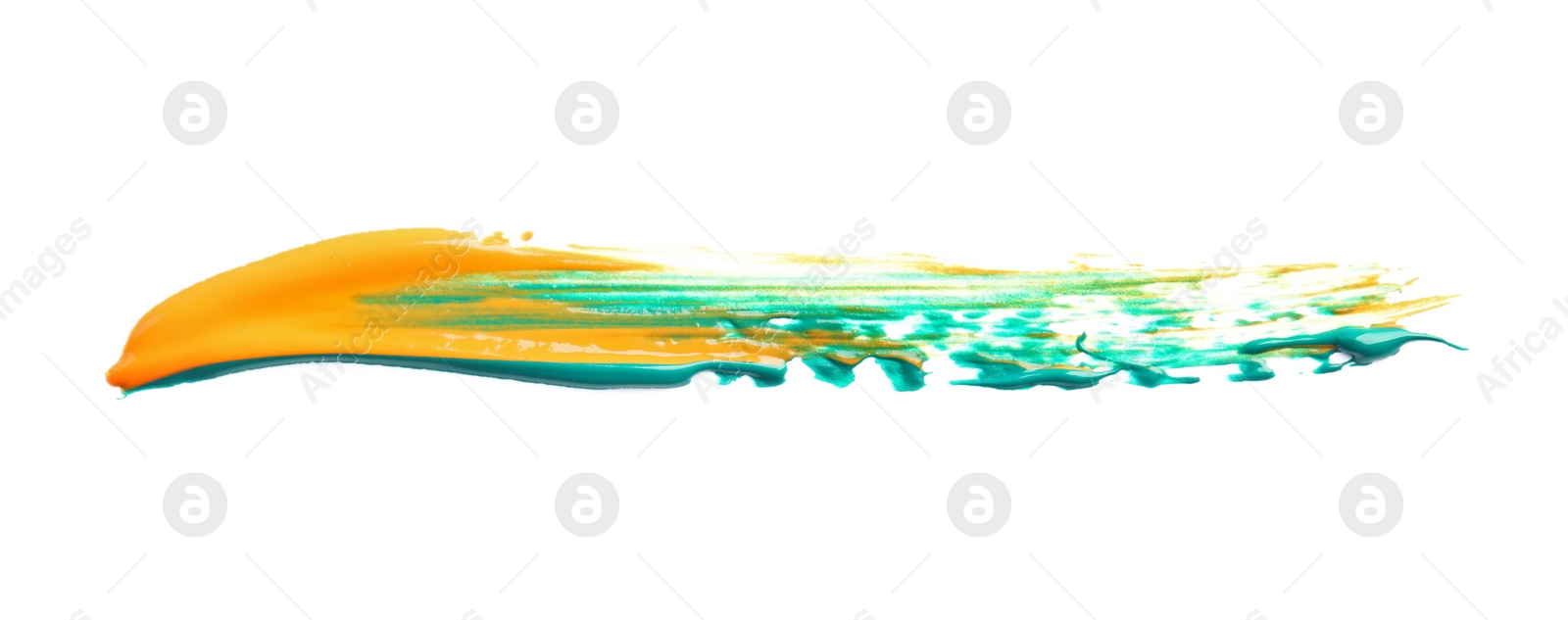 Photo of Abstract brushstroke of mixed color paint isolated on white