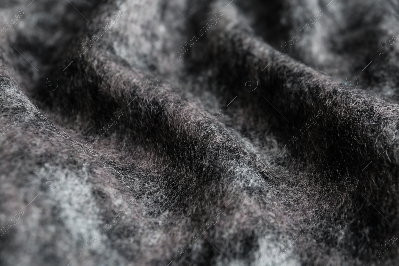 Photo of Texture of beautiful soft fabric as background, closeup